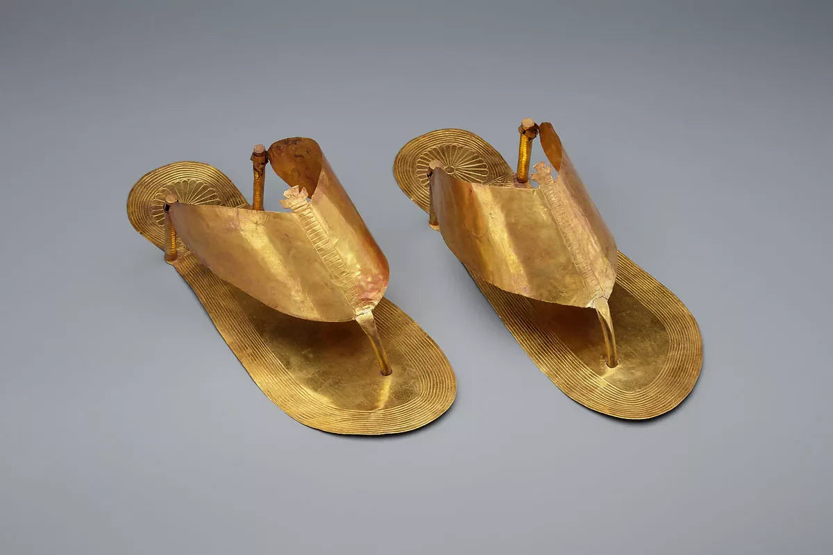 Gold flip flops