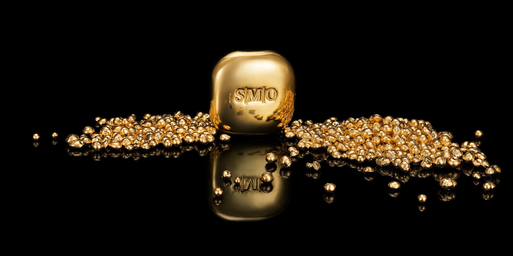 SMO Gold branded gold bar with gold balls